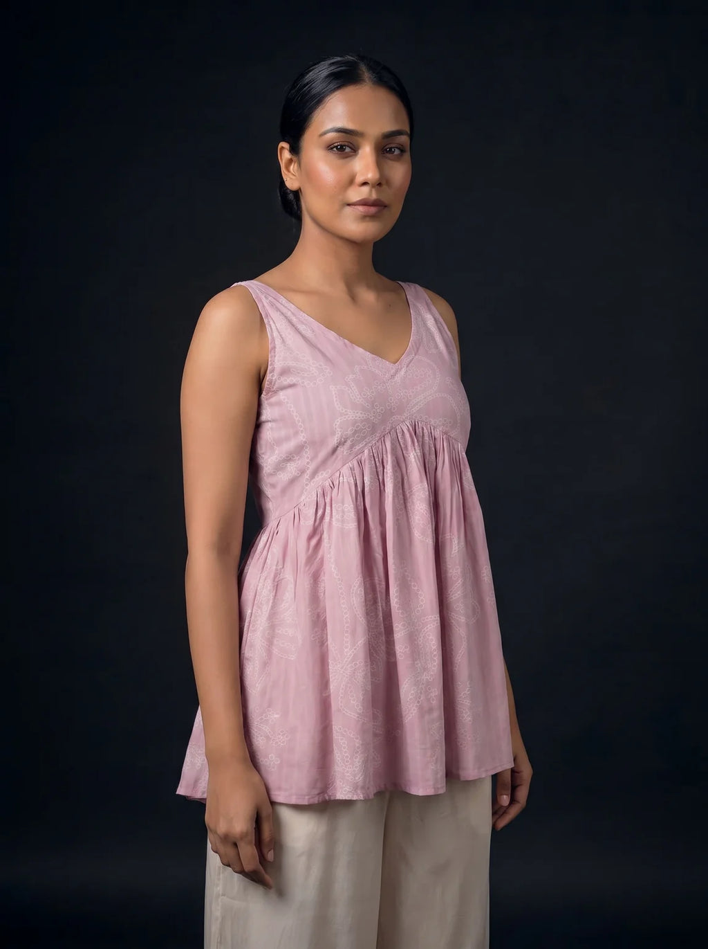 baby pink schiffli top three quarter view