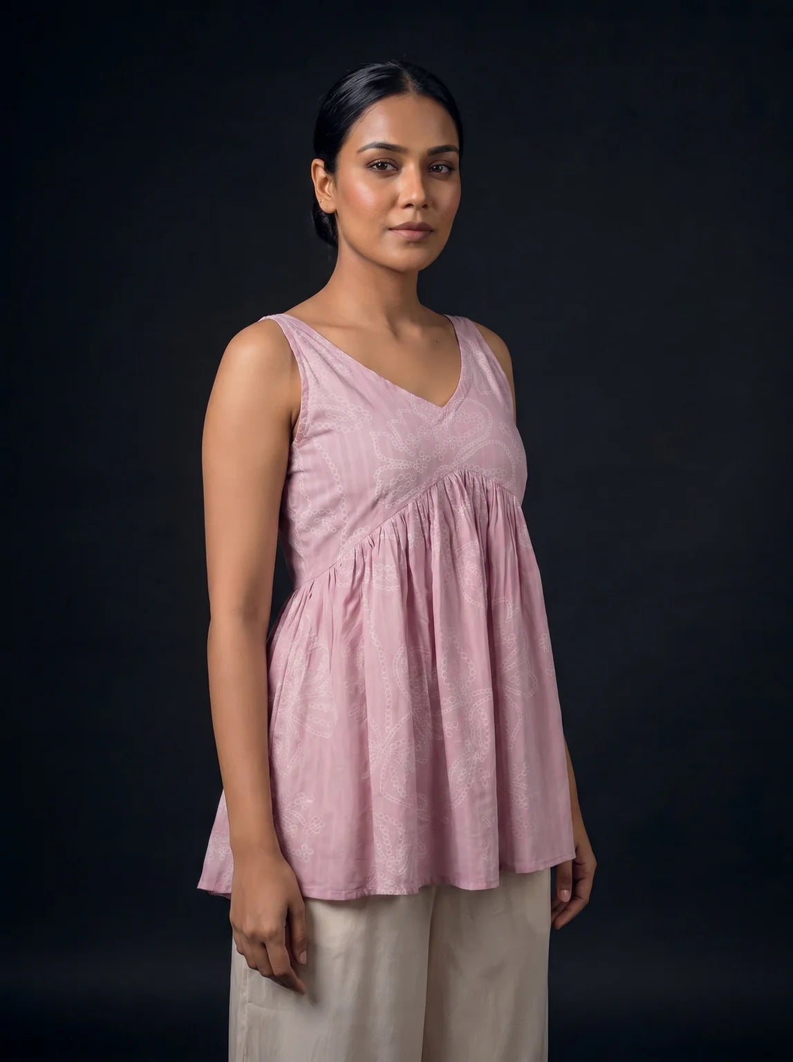 baby pink schiffli top three quarter view