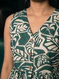 green botanical peplum top v neck button detail