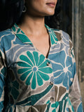 green floral peplum top lapel collar button detail