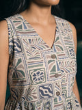 grey tropical tile print peplum top v neck button detail