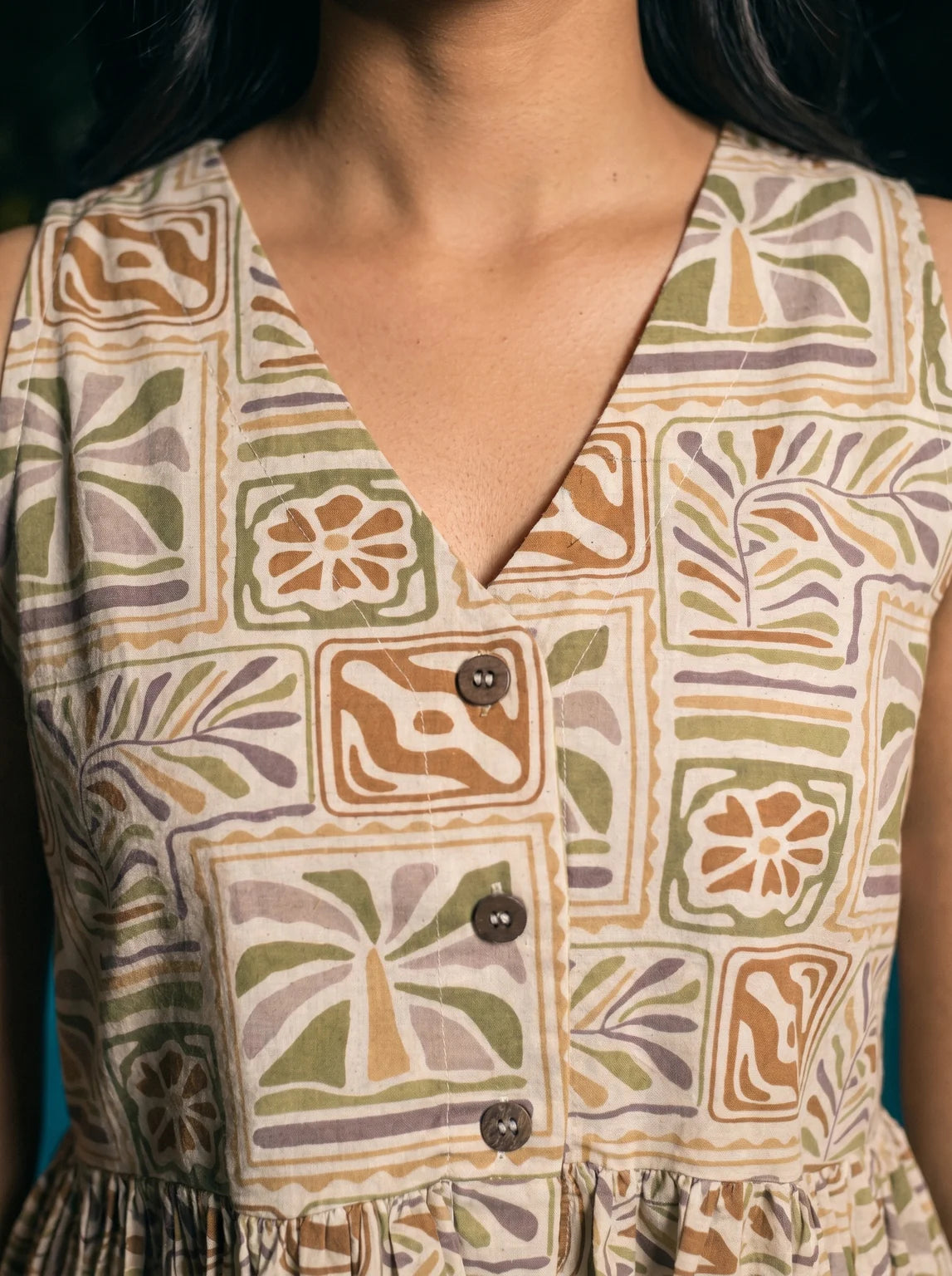 mustard tropical tile print peplum top v neck button detail