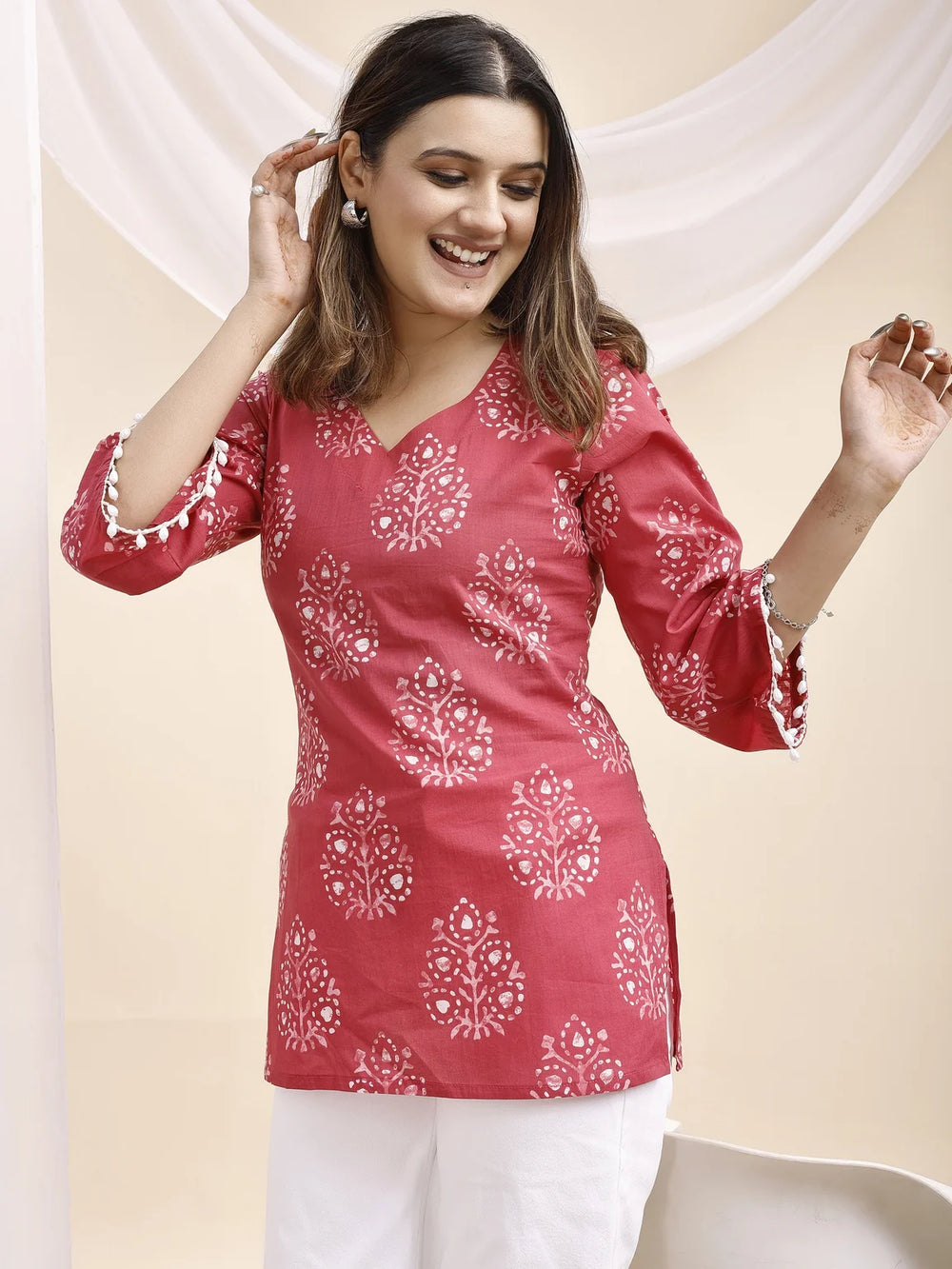 pink botanical print kurti styled pose