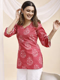 pink botanical print kurti styled pose