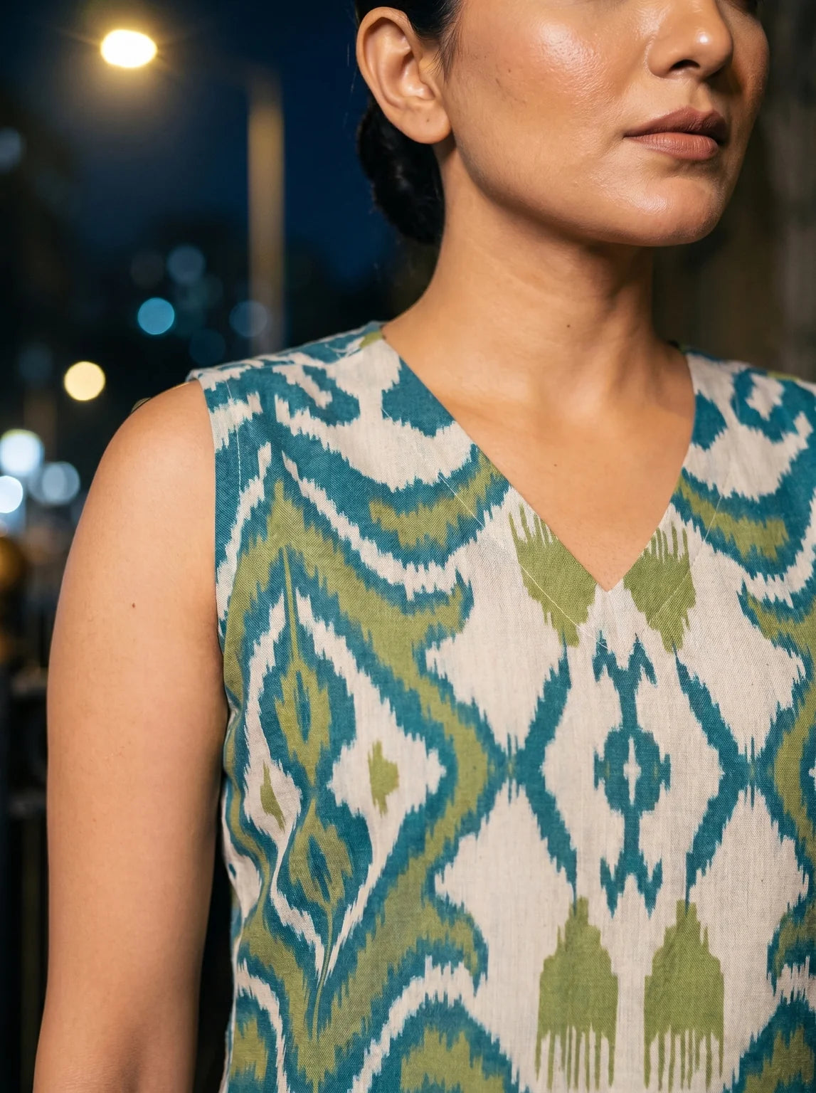 rama green ikat tunic neckline closeup print detail