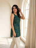 teal green block print kurti by window