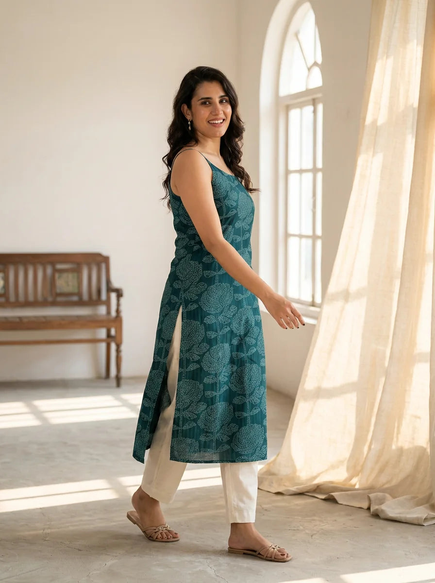 teal strappy kurta by window