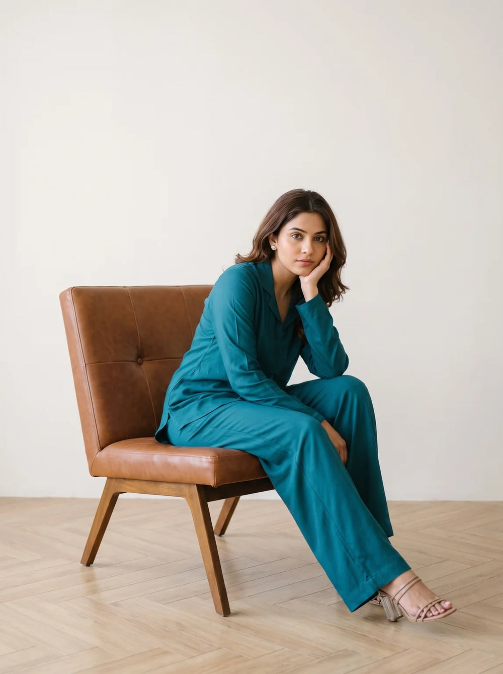 woman in teal solid viscose co ord set in a market lane